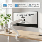 Vue arrière d'un moniteur fixé à un bras articulé noir par une plaque VESA standard, avec fixation par pince sur un bureau.